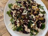 A picture of Spring greens, air fried cauliflower and beetroot salad with tahini dressing.