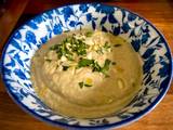 A picture of Almendras Soup with spiced almonds and cauliflower.