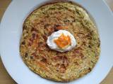 A picture of Omelette with onion and carrot.