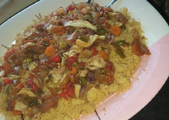 A picture of Couscous da vegetable souce.