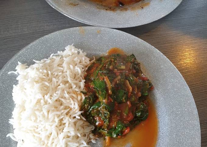 A picture of Tomato Stew infused with green vegetables.