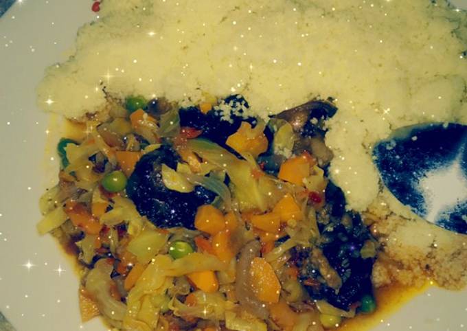 A picture of Couscous with vegetables sauce.