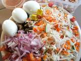 A picture of Beans Dumplings with veg salad.