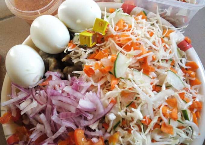 A picture of Beans Dumplings with veg salad.