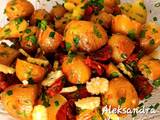 A picture of Warm potato salad with sundried tomatoes.