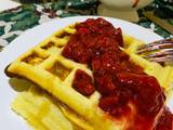 A picture of Halloween Waffles and Strawberry Sauce.