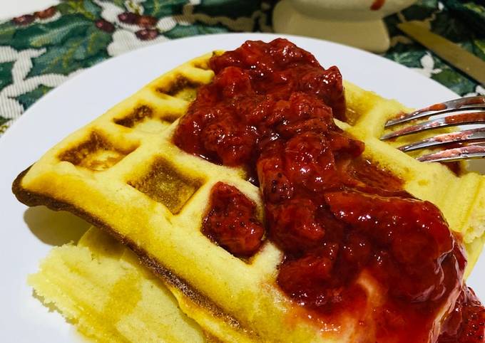 A picture of Halloween Waffles and Strawberry Sauce.