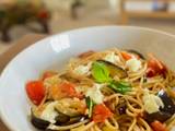 A picture of Aglio e olio inspired pasta with aubergine, tomato and mozzarella (⭐️ best ever summer pasta 🍝).