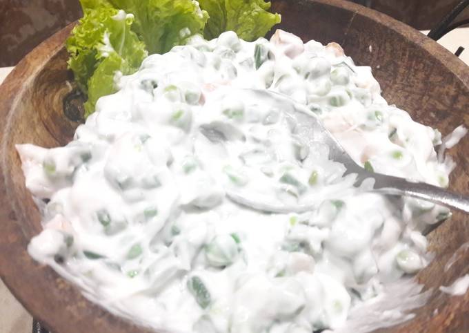 A picture of Mixed vegetable salad in creamy hung curd.