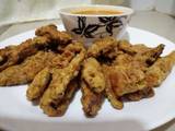 A picture of Fried aubergine fingers.