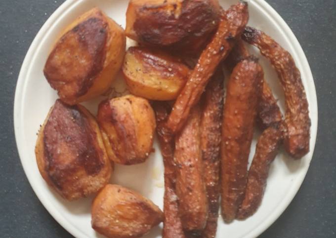 A picture of Slow Roasted Potatoes and Carrots.