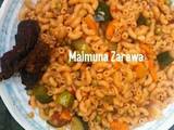 A picture of Macaroni vegetable jollof with grill beef.