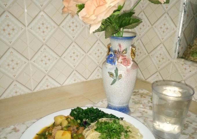 A picture of Spaghetti 🍝 with Beef vegetable stew and Steamed Spinach.