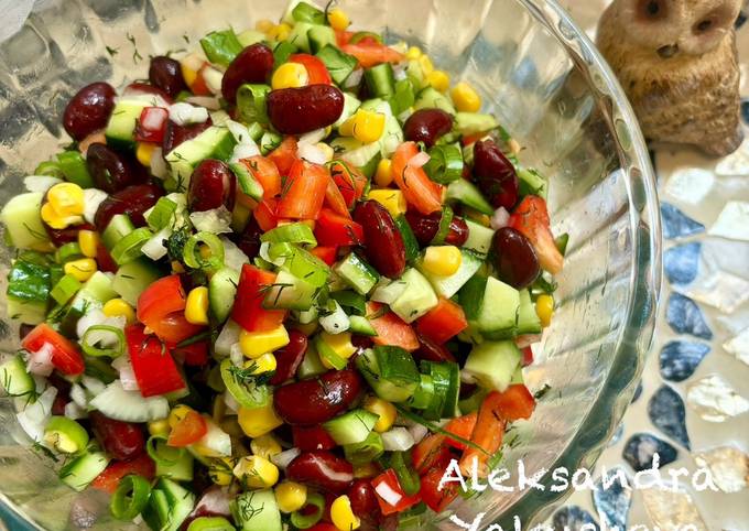 A picture of Vegetable salad with red beans.