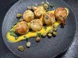 A picture of Crab balls with curry mayonnaise and capers.