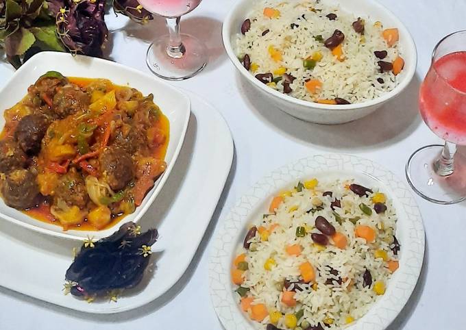 A picture of Butter veg rice with Italian meat ball and potato soup.