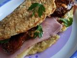 A picture of Ham, cheese and chilli sun-dried tomato Oat omelette wrap.