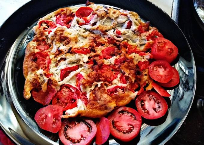 A picture of Tomato upside down omelette#cookingwithtomatoes.