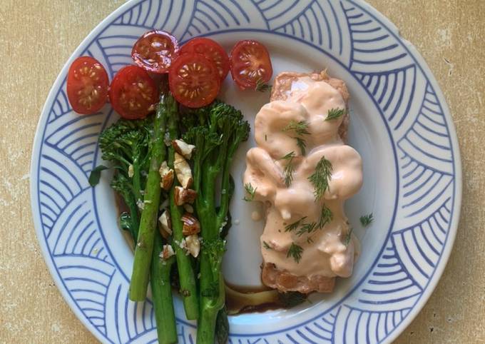 A picture of Garlic fry stirred veggies and Grilled Salmon with Prawn Cocktail.