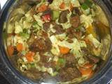 A picture of Vegetable salad with meat.