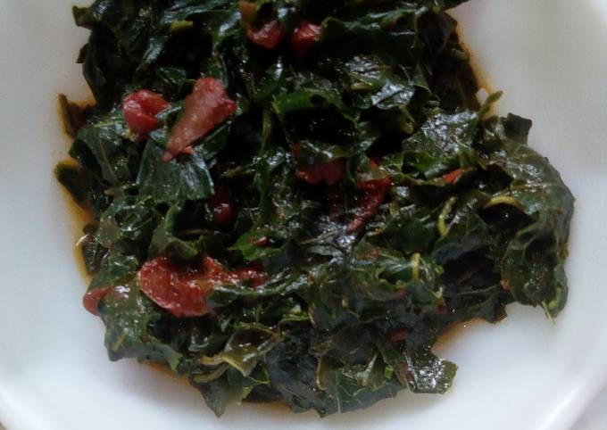 A picture of Terere/dodo served with millet roti, jaggery#vegetables.