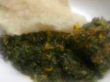 A picture of Vegetable soup and eba.