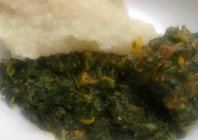 A picture of Vegetable soup and eba.