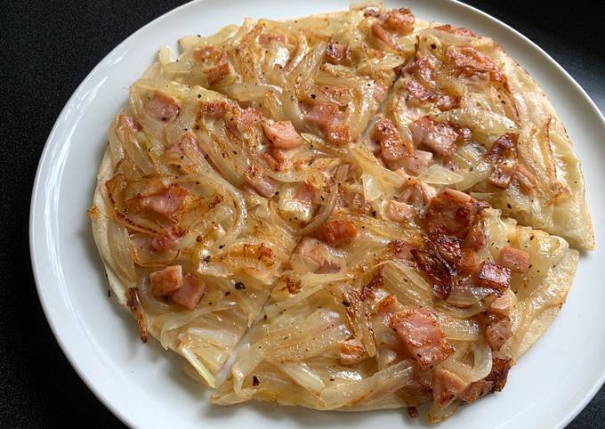 A picture of Pan Fried Onion Bacon Cheese Flatbread.