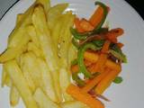 A picture of Fries and stir fry veges.