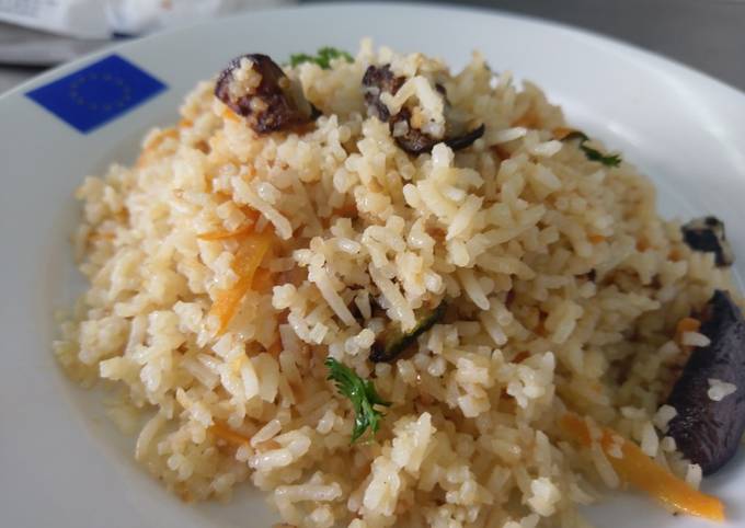 A picture of Eggplant and carrot rice.