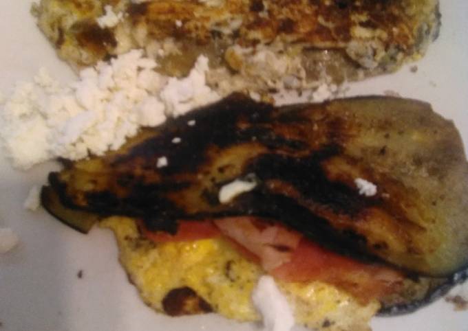 A picture of Aubergine breakfast sandwich.