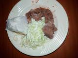 A picture of Beef ugali n steamed cabbage.