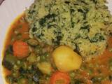 A picture of Spinach rice and vegetable curry.