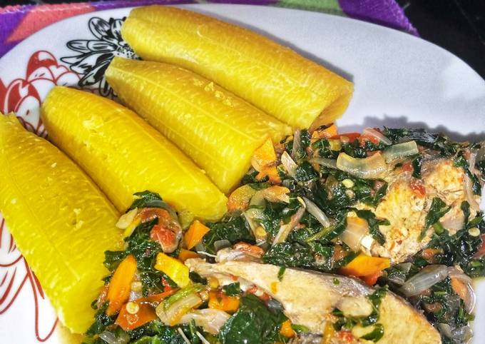 A picture of Boiled plantain and vegetable sauce.