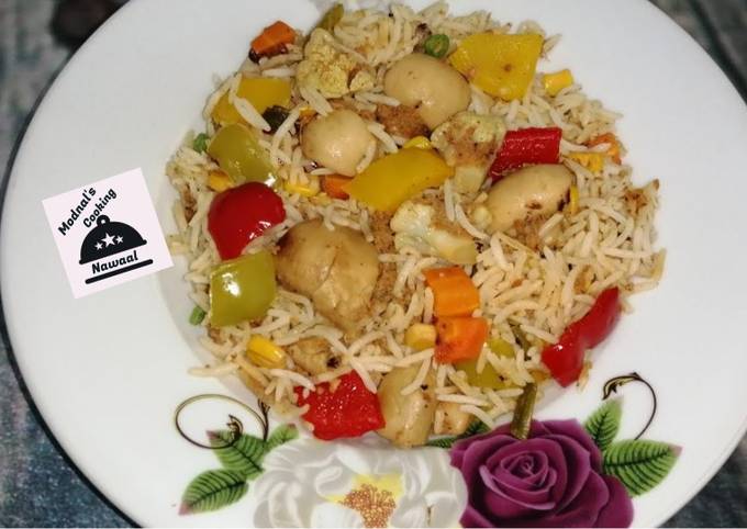 A picture of Stir fry vegetables and tuna rice.