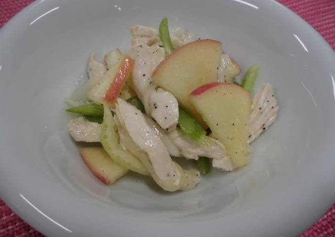 A picture of Marinated chicken breast with apple and aromatic vegetables.