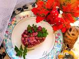 A picture of Beet salad with tuna.