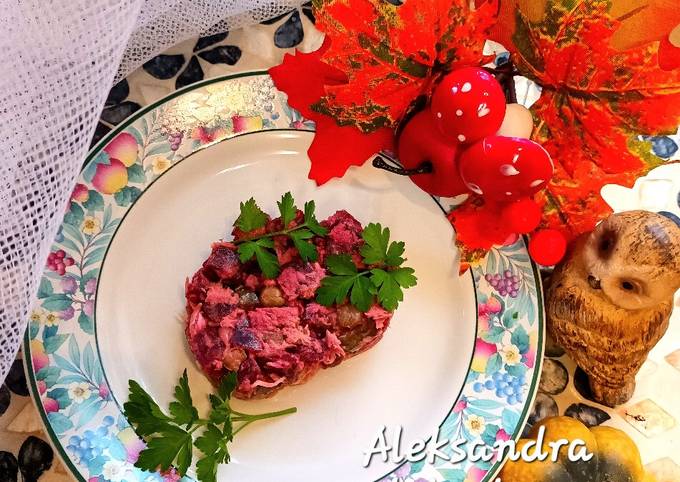 A picture of Beet salad with tuna.