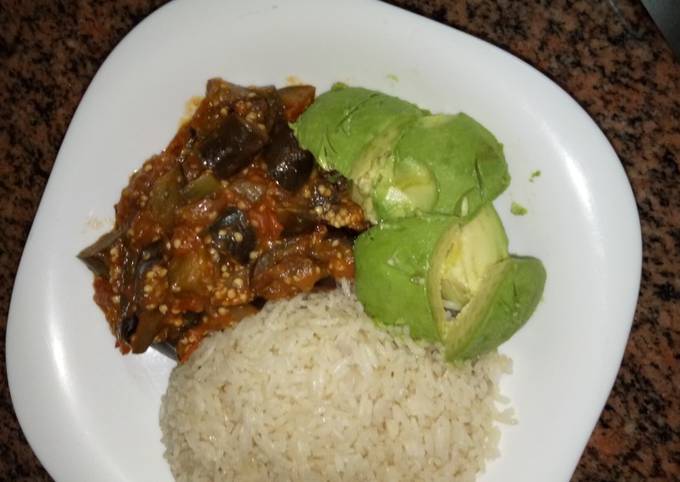 A picture of Rice eggplants curry and avocados #author marathon.