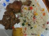 A picture of Fried chicken and vegetable rice #charity recipe.