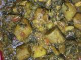 A picture of Potatoes and plantain porridge with vegetable.