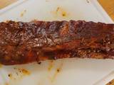 A picture of Oven backed Rib rack w/ homemade sauce and rub.