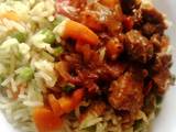 A picture of Wet fry goat meat with vegetable rice.