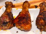 A picture of Baked chicken drumsticks.