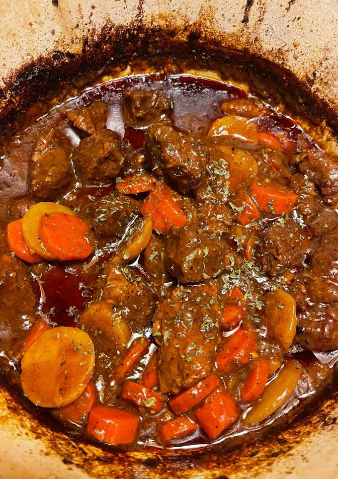 A picture of Beef stew in a Dutch Oven.