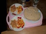 A picture of Prepared Ugali cabbage and fried eggs.