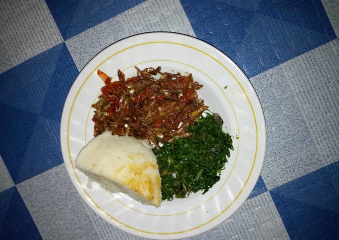 A picture of Ugali,fried kales and fried omena.