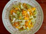 A picture of Mango lettuce salad.