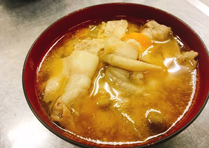 A picture of Miso soup with pork and vegetables   "Tonjiru".