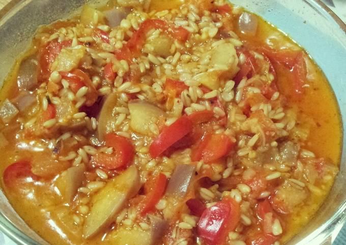 A picture of Oat groats and fruit vegetable stew.